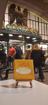 PudimNews in front of the most beautiful mcdonald's